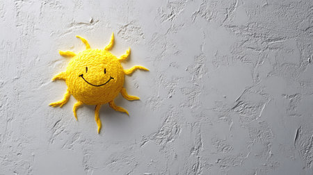 This vibrant and cheerful image features a smiling sun on a textured wall. Ideal for conveying warmth and happiness in various creative projects.の素材