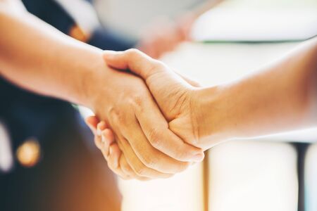 Agreement business handshake of two businessman shaking hands.の写真素材