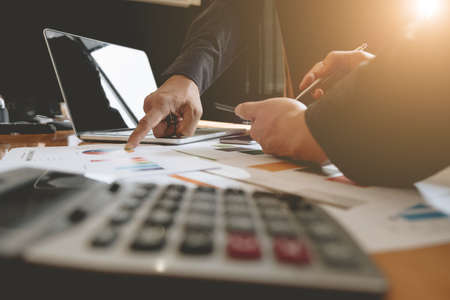 Business Corporate People discussing the charts and graphs showing the results of their successful teamwork, Working Conceptの写真素材