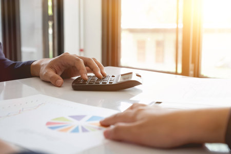 Business People Analyzing Statistics Business Documents, Financial Conceptの写真素材