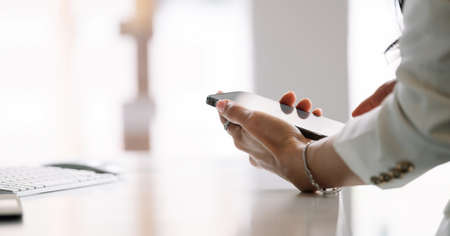 Close up woman use of smart phone.の写真素材