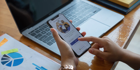 CHIANG MAI, THAILAND - JAN 23, 2021 : A working from home employee is downloading the Microsoft Teams social platform, ready for remote working in isolation from homeのeditorial素材