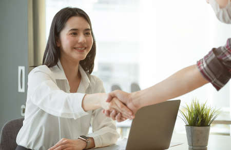 Asian Business people shaking hand, finishing up meeting, business etiquette, congratulation, merger...
