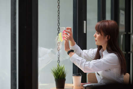 business woman   notes idea discussing and planning in glass wall, Business financial concept.の写真素材