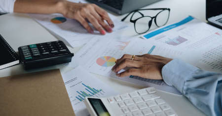 Group of business people busy discussing financial matter during meeting. Corporate Organization Meeting Concept.の写真素材