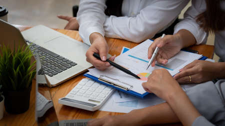 Business People Analyzing Statistics Business Documents, Financial Accounting Concept.の写真素材
