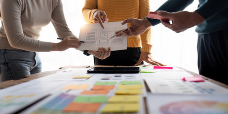 Close up view of brainstorm team of creative Web Graphic Designer ux developer and ui designer...