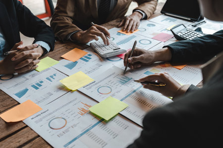 Business people meeting business consulting brainstorming project analysis report check investment. Marketing plan researching. Paperwork on the tableの写真素材