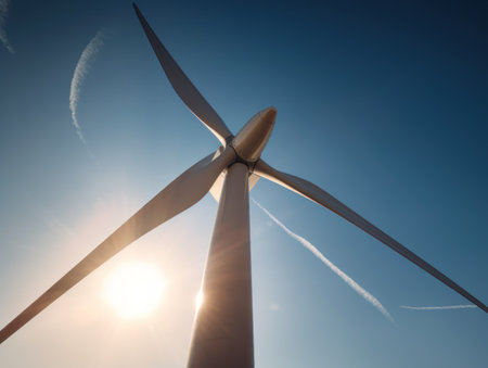 Wind turbines generating electricity with blue sky, energy conservation concept. Generative AIの素材