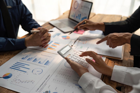 Meeting business team advisor about financial graph chart showing results are analyzing and...