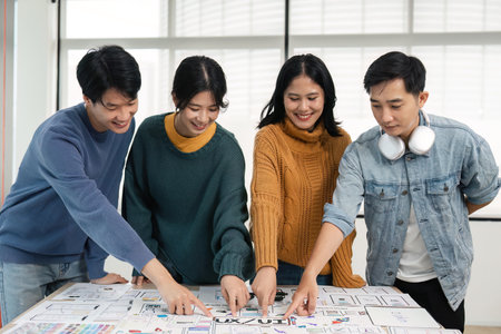 Brainstorm planing creative teamwork, Close up of hands mobile phone app developer team meeting about screen display prototype layout for smartphone, ui, ux conceptの写真素材