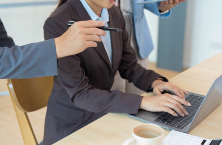 Business team briefing of financial analyze about company graph profit. finance, strategy, meeting concept on labtopの写真素材