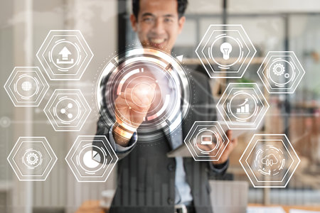 Businessman hand working with tablet in modern office with virtual icon diagram