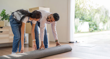 Couple Indian moving into a new house, Relocation, moving to new home conceptの写真素材