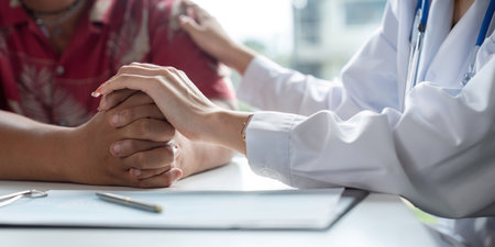 Doctor holding hands and patient empathy, healthcare or medical trust, hope and faith in therapy, healing and rehabilitation in mental health consultingの写真素材