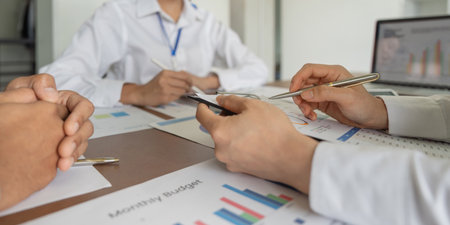 Business finance, Accounting, Investment advisor, Business team marketing plan consulting companies using laptops and computer analysis business brainstorm conference presentationの写真素材