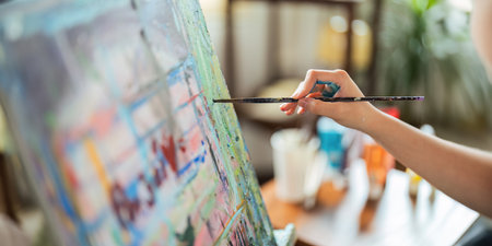 hand of artist with brush painting picture art, creativity, artistic and artwork, painting conceptの写真素材