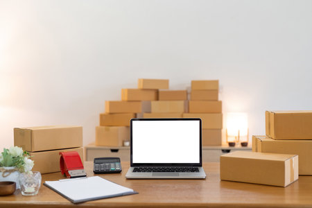 Mockup of white empty display laptop with box. Concept of online businessの写真素材