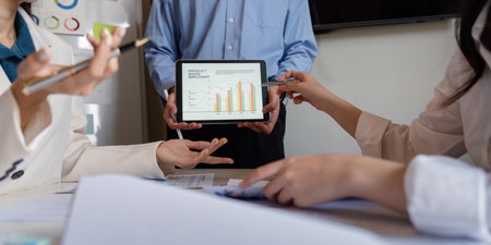 Business team talking planning analyze investment and marketing on tablet, collaboration discussing...