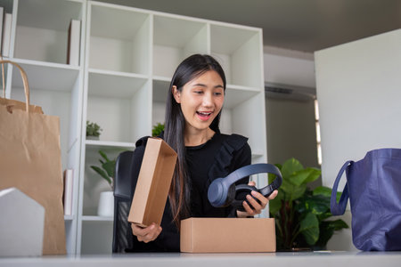 Thrilled Buyer Discovering New Headphones in Package