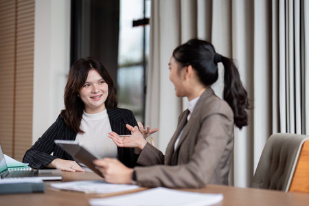 Business Team Engaged in Strategic Discussion in Office Environmentの写真素材