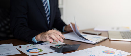 Accountant Conducting Financial Calculations for Data Accuracy