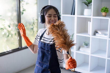 Focused Cleaner Wiping Glass Detail Oriented Home Cleaning Conceptの写真素材