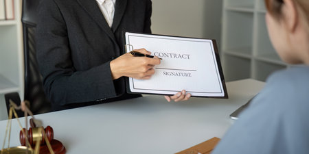 Lawyer signing contract in office environment business transaction professional setting close up...