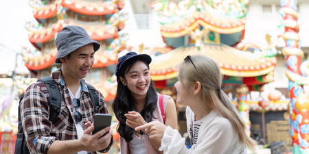 Travel adventures with friends at a vibrant festival colorful streets candid moments joyful atmosphereの写真素材