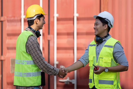 Logistics and engineering collaboration in a construction environment.の写真素材