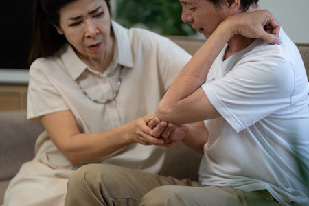 Elderly couple providing emotional support during health challenges, demonstrating love and care.の写真素材