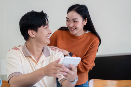 Couple discussing financial documents and bills.の写真素材