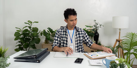 Business analysis with charts and graphs in modern officeの写真素材
