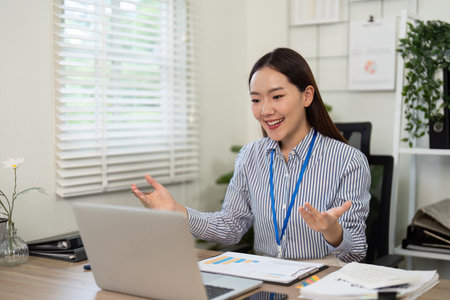 Dynamic Engagement. Young woman enthusiastically participating in a video call.