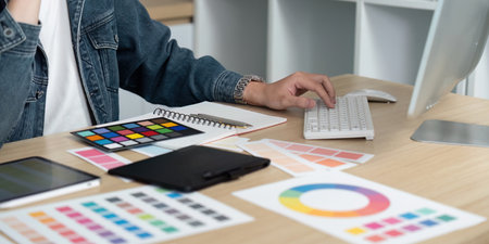 Design Workspace: Professional Engaged in Color Coordination