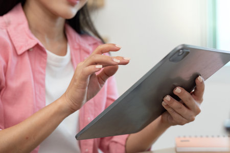Work from Home Woman Using Tablet for Work Tasks