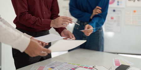 UX and UI Design Team Reviewing Concepts in Meetingの写真素材