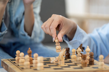Close-Up of Chess Move Strategic Gameplay at Home