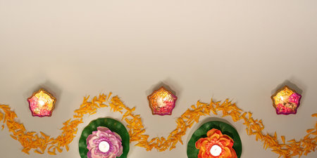 Diwali Decor. Elegant Arrangement of Diyas and Marigold Flowers for Festival of Lights