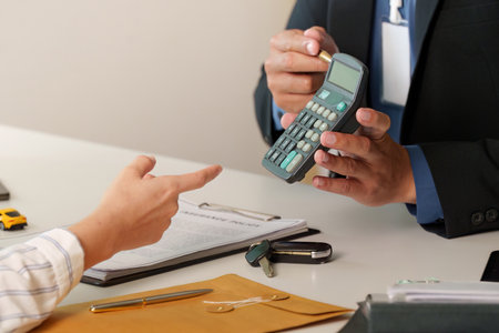 Calculating Car Insurance Premium with Clientの写真素材