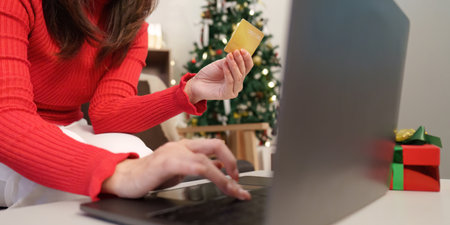 Online Christmas Shopping with Credit Card in Hand