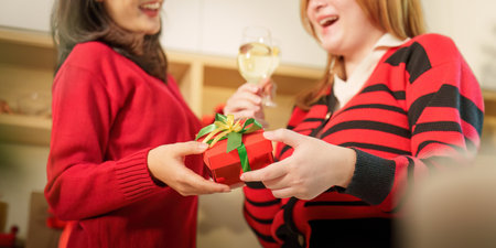 Celebrating Christmas with Friends and Holiday Giftsの写真素材