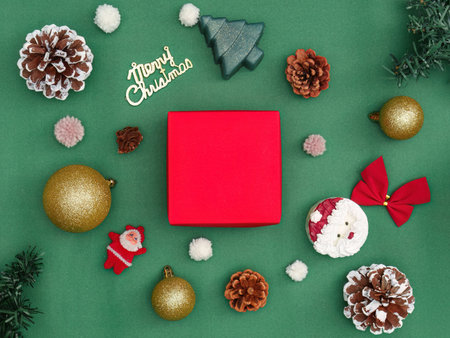 Christmas Background with Red Gift Box and Holiday Decorationsの写真素材