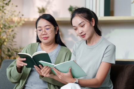 Mother and Daughter Reading Together in Cozy Living Room
