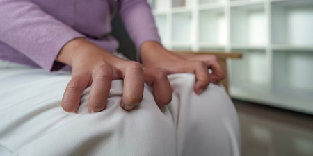 Anxiety Symptoms. Close-up of hands showing signs of anxiety and distress.の写真素材