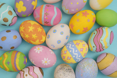Easter Eggs Collection. A variety of beautifully painted eggs on a blue background.