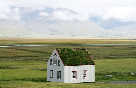Nice Icelandic house with turf roofの写真素材