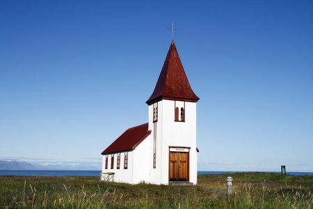 Beautiful Icelandic church in Hellnar - picturesque town on Snaefellsnes penisulaの写真素材