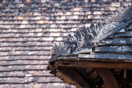 The sculpture on the roof ridge is in Wat Ton keawn , ChiangMai, Thailand.