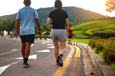 Group of people exercise walking in the park in morning. healthy concept. image